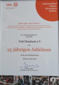 Bild zeigt die Urkunde zum 15-jährigen Bestehen der Tafel Butzbach